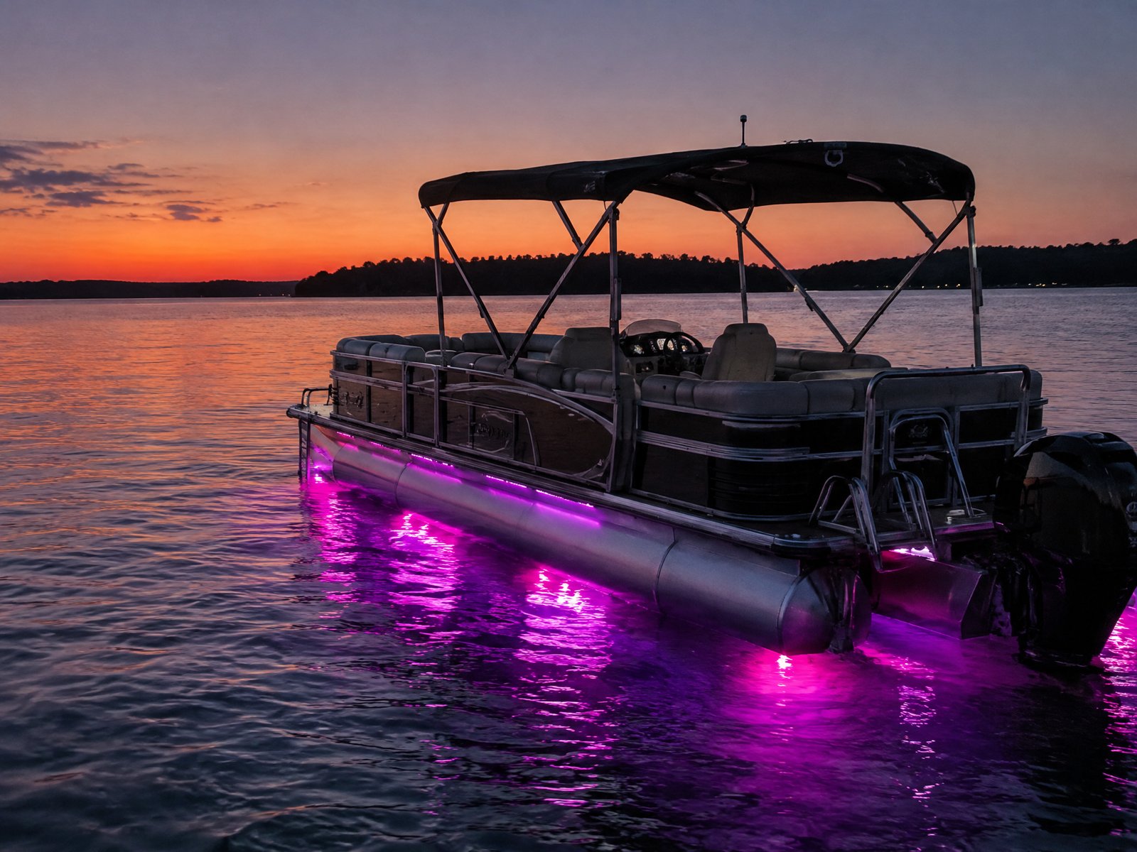 Magenta and purple underwater lighting on a pontoon.